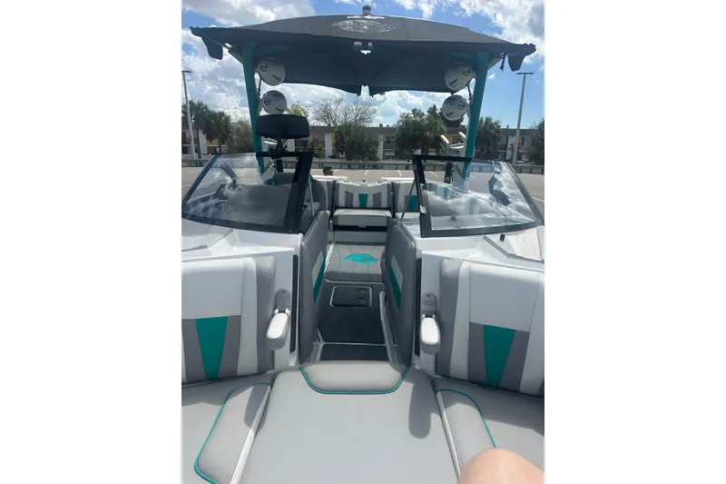 Slide: The Image of 2022 Malibu Wakesetter 23 LSV interior with modern seating and sleek design. - 11