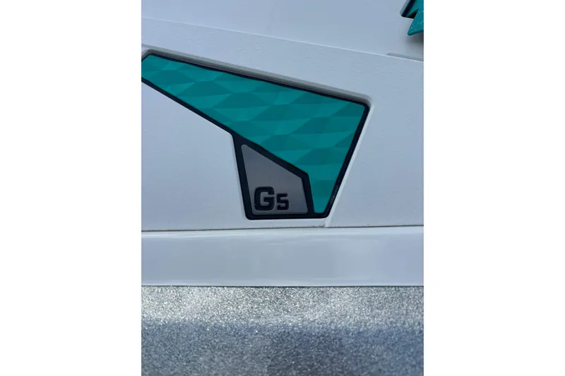 Slide: The Image of Close-up of 2022 Malibu Wakesetter 23 LSV G5 logo on boat exterior. - 13