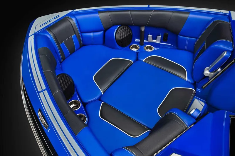 Slide: The Image of Manufacturer Provided Image: 2022 Malibu Wakesetter 23 LSV boat interior with blue and black seating. - 3