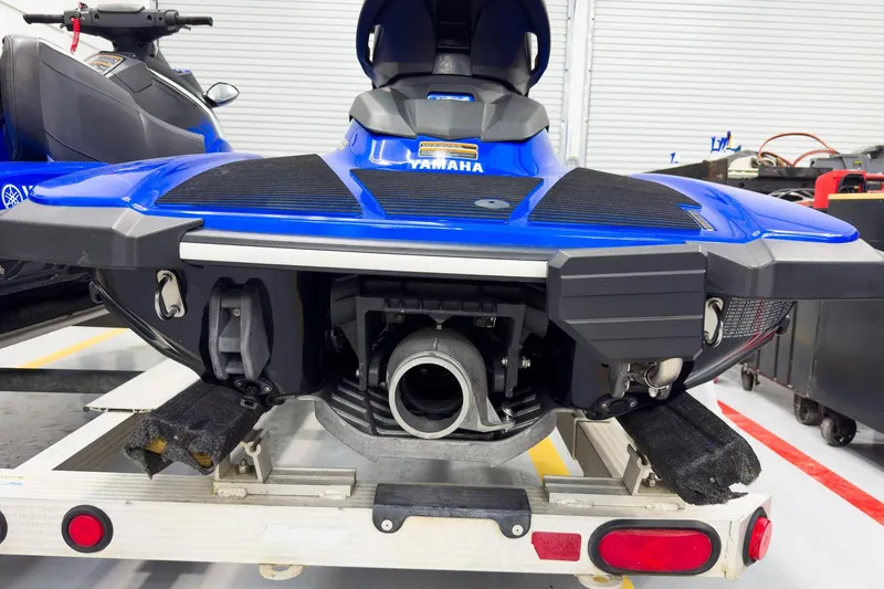 Slide: The Image of 2018 Yamaha WaveRunner EX Deluxe on trailer, rear view in garage setting. - 10
