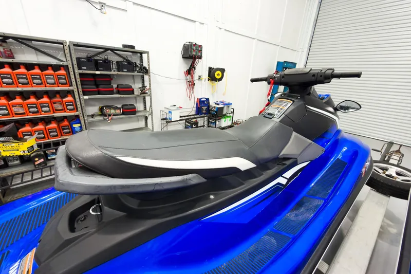 Slide: The Image of 2018 Yamaha WaveRunner EX Deluxe in a garage with maintenance supplies. - 15