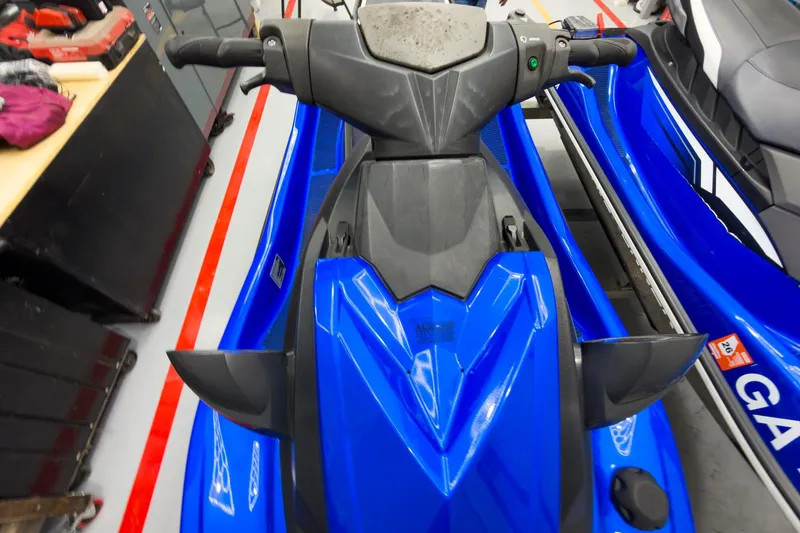Slide: The Image of 2018 Yamaha WaveRunner EX Deluxe, blue, in a garage setting. - 17