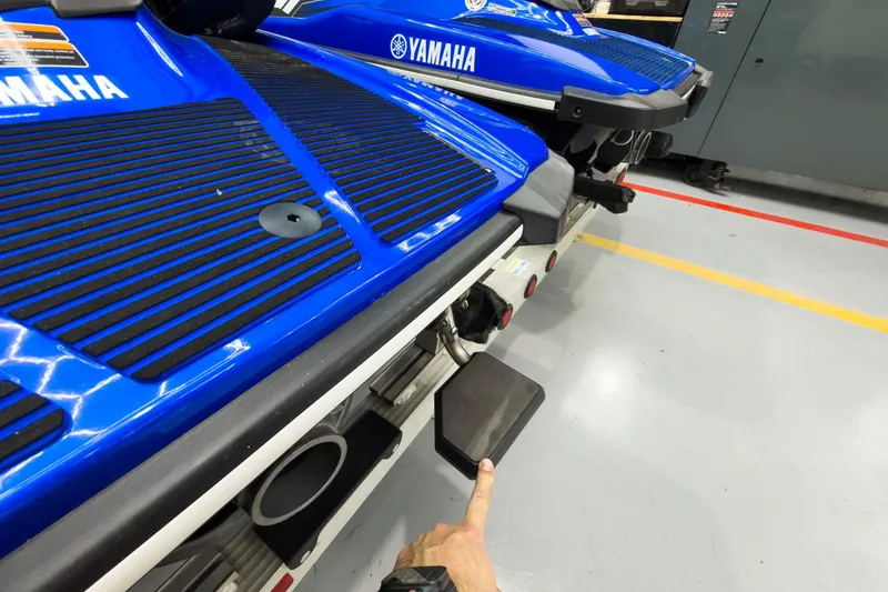 Slide: The Image of 2018 Yamaha WaveRunner EX Deluxe, blue, rear view in a garage setting. - 9