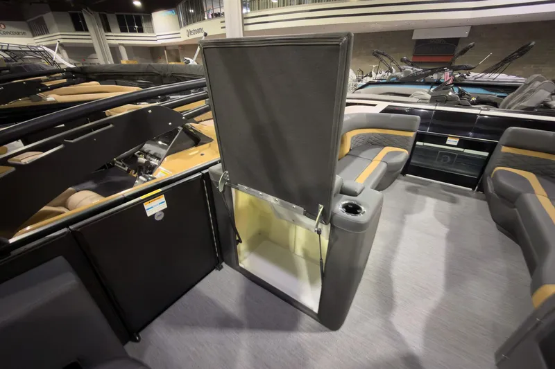 Slide: The Image of 2026 Godfrey Monaco 255 Ultra Lounge interior with open storage compartment. - 20