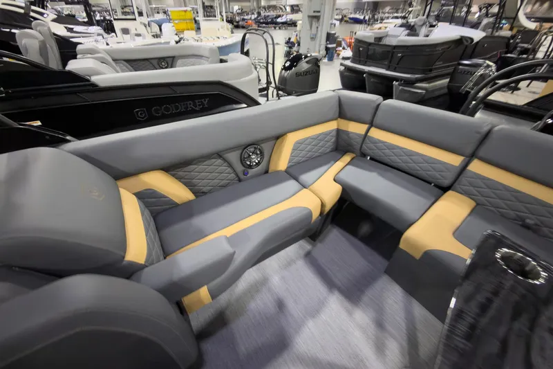 Slide: The Image of Luxurious seating on 2026 Godfrey Monaco 255 Ultra Lounge boat, featuring modern design and comfort. - 23