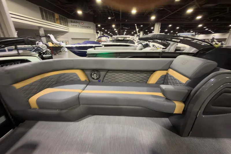 Slide: The Image of Luxurious interior of 2026 Godfrey Monaco 255 Ultra Lounge boat at an indoor exhibition. - 7