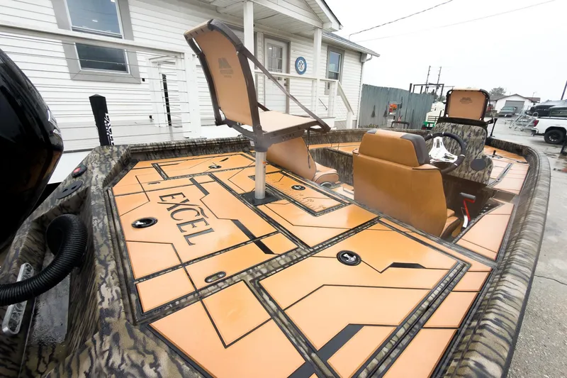 Slide: The Image of 2026 Excel EX203C Crappie & Bass boat with custom seating and deck design. - 10