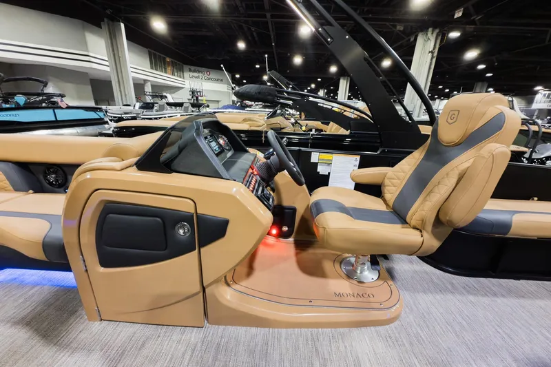 Slide: The Image of Luxurious 2026 Godfrey Monaco 255 boat interior with premium seating and modern dashboard. - 10