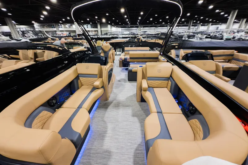 Slide: The Image of Luxurious interior of 2026 Godfrey Monaco 255 Mid-Table Single Flip Lounge boat. - 4