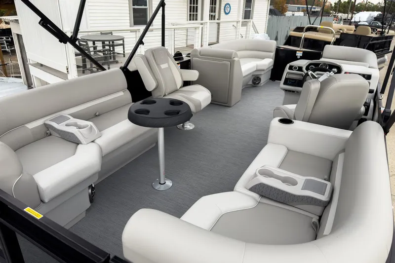 Slide: The Image of 2026 Godfrey Sweetwater Xperience 20' pontoon with split bench seating and modern interior design. - 13