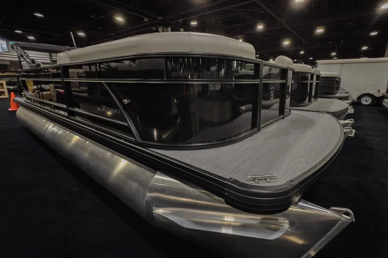 Slide: The Image of 2026 Godfrey Sweetwater Xperience 20' Split Bench Pontoon, sleek design, showcased indoors. - 26