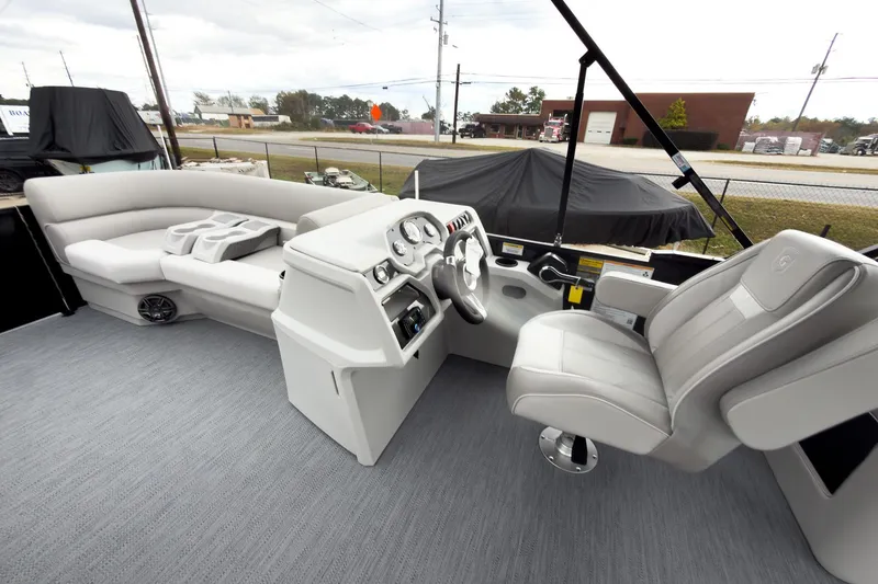 Slide: The Image of 2026 Godfrey Sweetwater Xperience 20' Split Bench Pontoon interior with modern helm and seating. - 7