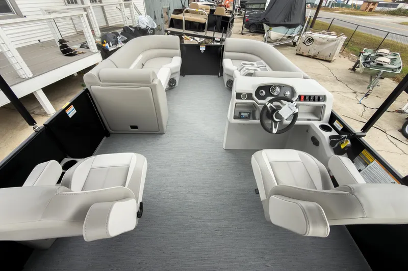 Slide: The Image of 2026 Godfrey Sweetwater Xperience 20' Split Bench Pontoon interior with modern seating and helm. - 16