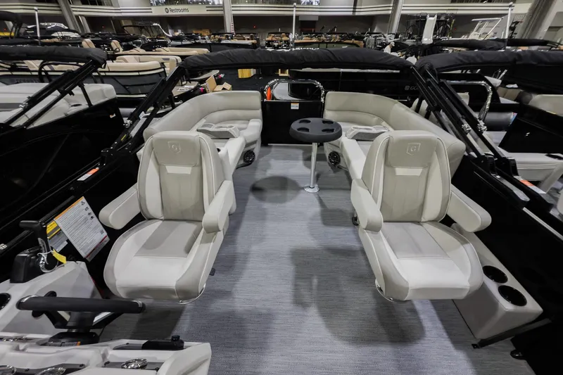 Slide: The Image of 2026 Godfrey Sweetwater Xperience 20' Split Bench Pontoon interior with plush seating. - 30
