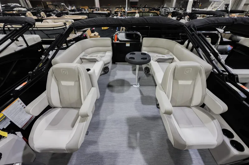 Slide: The Image of 2026 Godfrey Sweetwater Xperience 20' pontoon with split bench seating and modern interior design. - 32
