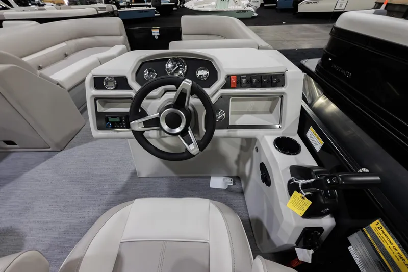 Slide: The Image of 2026 Godfrey Sweetwater Xperience 20' Split Bench Pontoon interior with steering console and seating. - 37