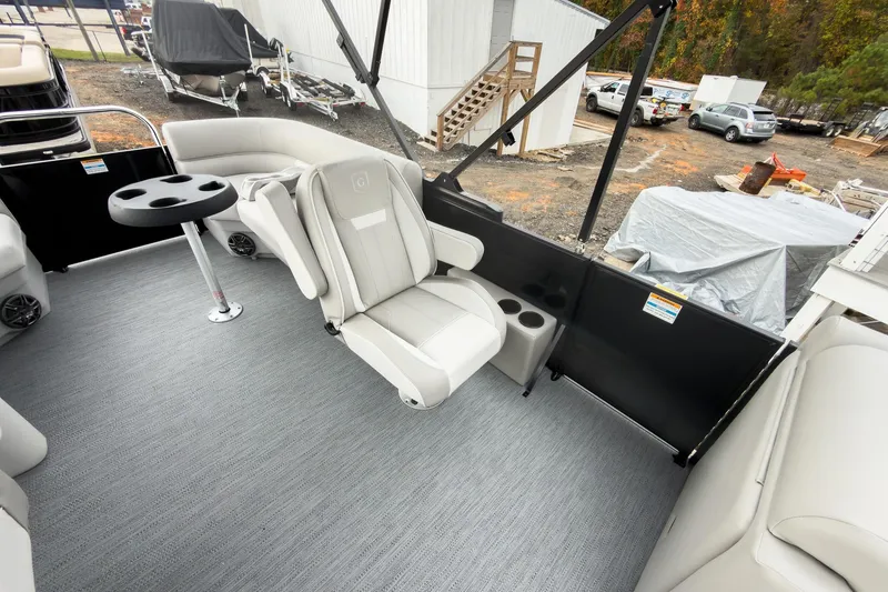 Slide: The Image of 2026 Godfrey Sweetwater Xperience 20' pontoon interior with split bench seating and table. - 9