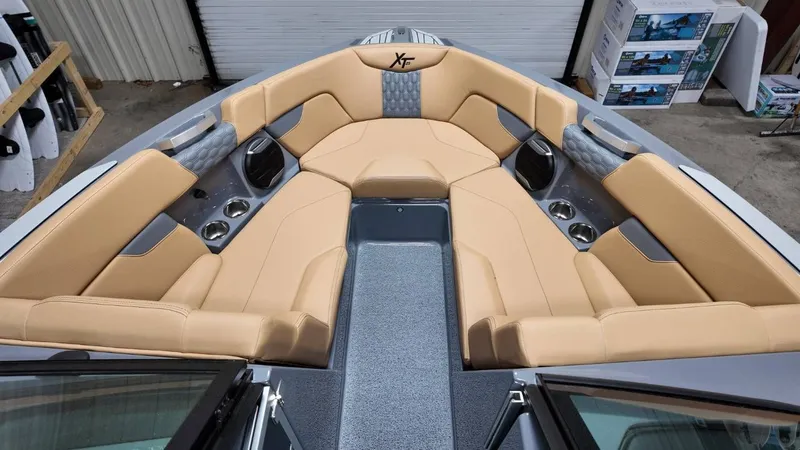 Slide: The Image of Interior of 2026 MasterCraft XT23 with luxurious seating. - 22