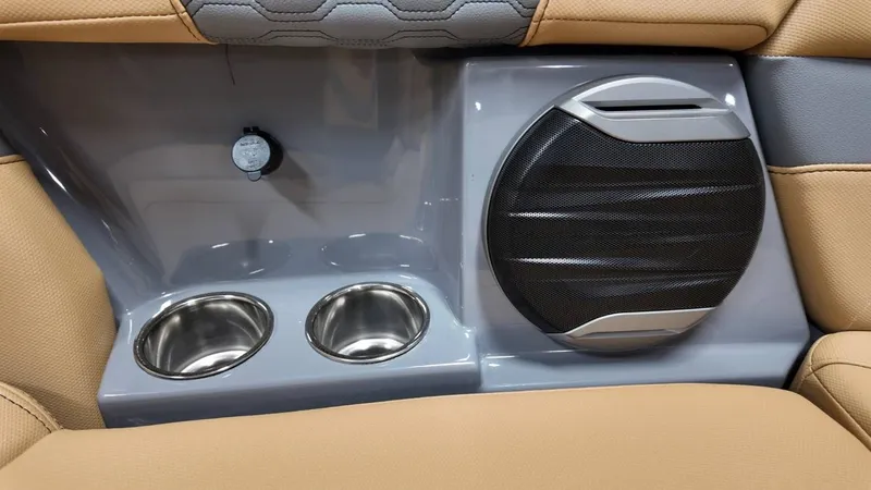 Slide: The Image of MasterCraft XT23 2026 interior with speaker and cup holders. - 23