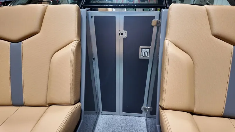 Slide: The Image of Interior of 2026 MasterCraft XT23 with beige seating. - 32