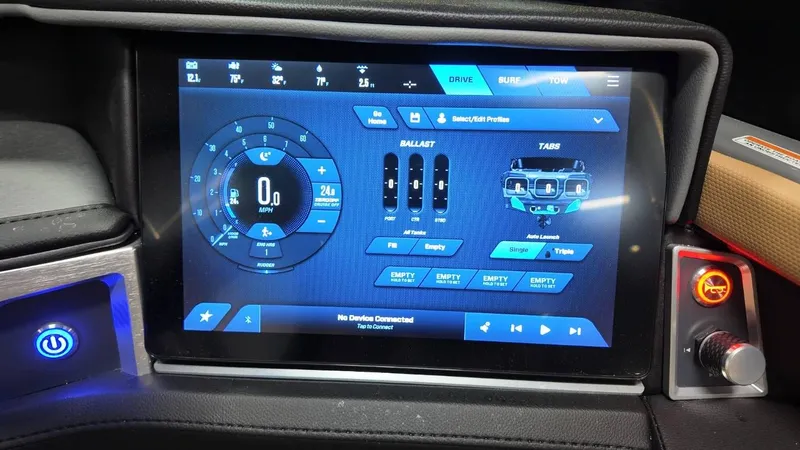 Slide: The Image of 2026 MasterCraft XT23 boat control with touchscreen display. - 36