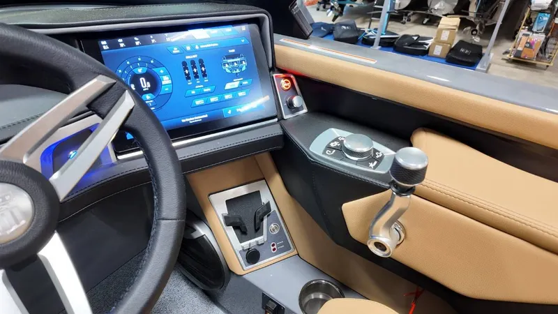 Slide: The Image of 2026 MasterCraft XT23 interior with modern dashboard and touchscreen display. - 41