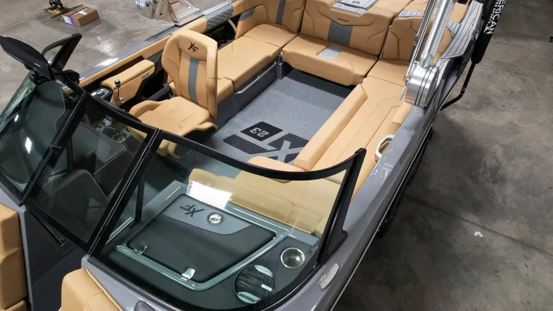 Slide: The Image of Interior view of 2026 MasterCraft XT23 with luxurious seating. - 44
