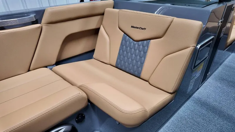 Slide: The Image of Interior of 2026 MasterCraft XT23 with beige leather seats. - 48