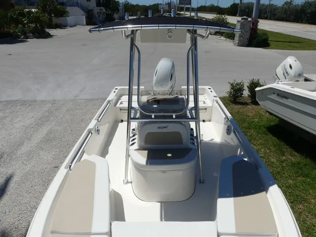 Slide: The Image of 2026 Bulls Bay 2200 XS boat with T-top and seating area. - 13