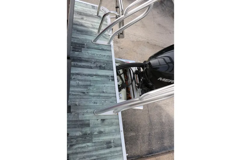 Slide: The Image of 2019 Crest II 240 SL boat with Mercury outboard motor and sleek deck design. - 30