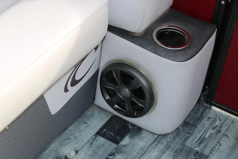 Slide: The Image of 2019 Crest II 240 SL boat interior with speaker and cup holder. - 40