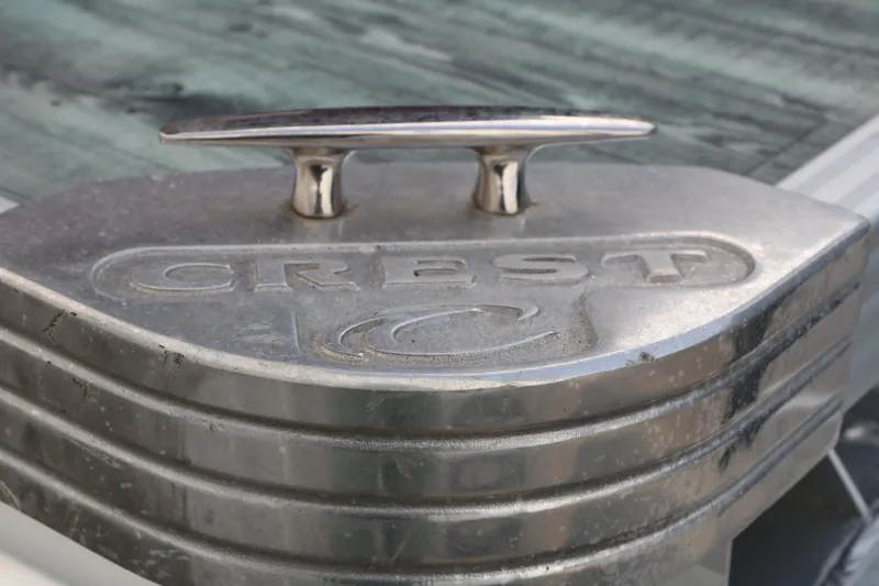 Slide: The Image of Close-up of 2019 Crest II 240 SL boat cleat with embossed logo. - 42