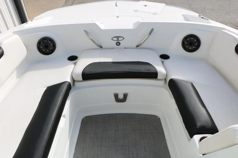 Slide: The Image of Interior of 2017 Tahoe 1950 boat with black and white seating. - 22