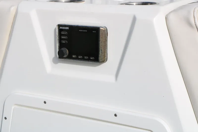 Slide: The Image of Kicker media center on 2017 Tahoe 1950 boat dashboard. - 27