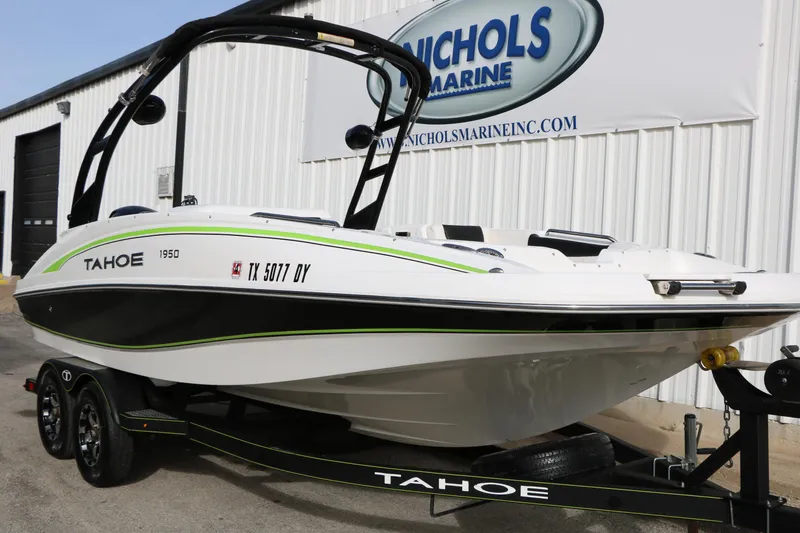 Slide: The Image of 2017 Tahoe 1950 boat on trailer at Nichols Marine dealership. - 3