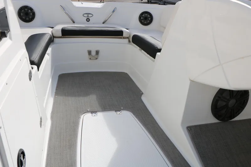 Slide: The Image of Interior of 2017 Tahoe 1950 boat with seating and speakers. - 30