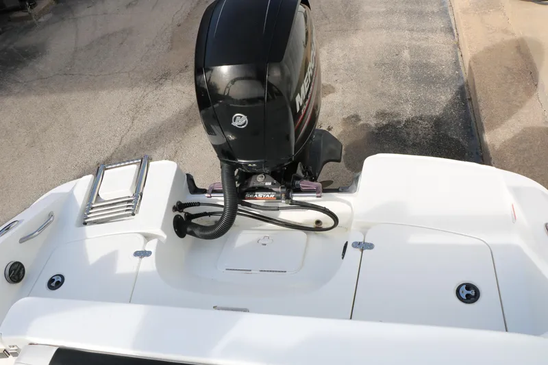 Slide: The Image of Rear view of 2017 Tahoe 1950 boat with Mercury outboard motor. - 32