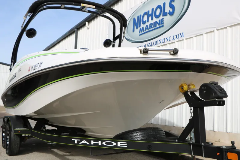 Slide: The Image of 2017 Tahoe 1950 boat on trailer at Nichols Marine dealership. - 4