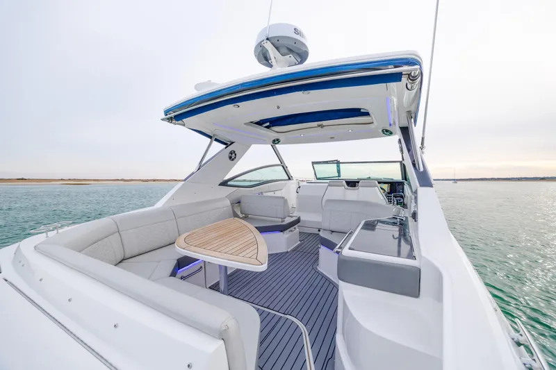 Slide: The Image of 2020 Sea Ray Sundancer 320 Outboard, luxurious interior, spacious seating, ocean view. - 41