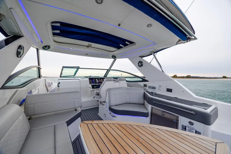 Slide: The Image of Luxurious interior of 2020 Sea Ray Sundancer 320 Outboard with elegant seating and modern amenities. - 43