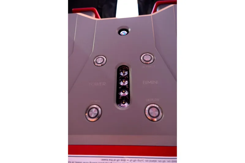 Slide: The Image of Control panel of 2025 Supra SE with buttons for tower and bimini functions. - 18