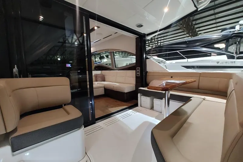 Slide: The Image of Luxurious interior of 2017 Sea Ray Sundancer 400 yacht with elegant seating and table. - 10