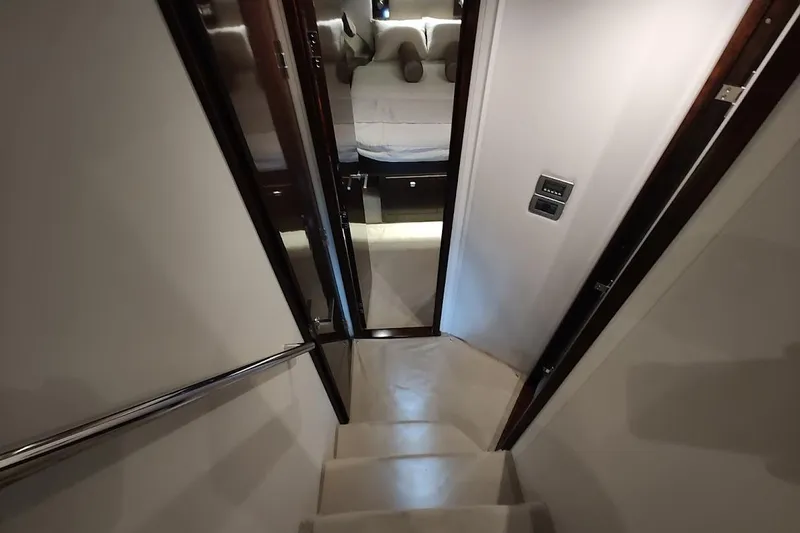 Slide: The Image of Stairway leading to cabin interior of 2017 Sea Ray Sundancer 400 yacht. - 19
