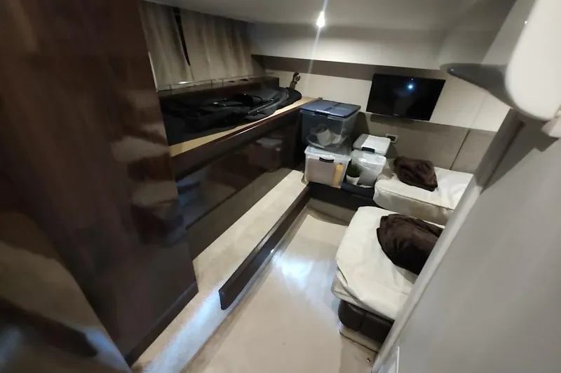 Slide: The Image of Interior cabin of 2017 Sea Ray Sundancer 400 yacht with twin beds and storage. - 20