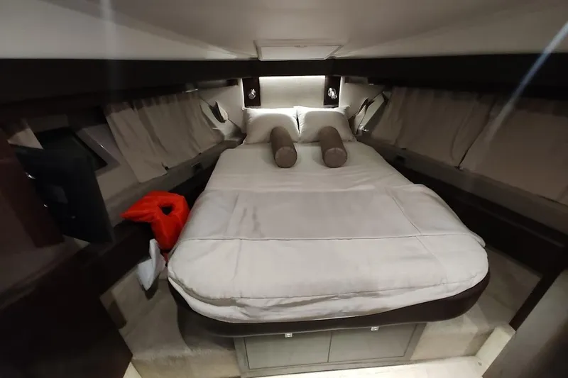 Slide: The Image of Luxurious cabin interior of 2017 Sea Ray Sundancer 400 yacht with cozy bed and modern decor. - 22