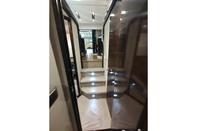 Slide: The Image of Interior view of 2017 Sea Ray Sundancer 400 yacht with illuminated stairs. - 25