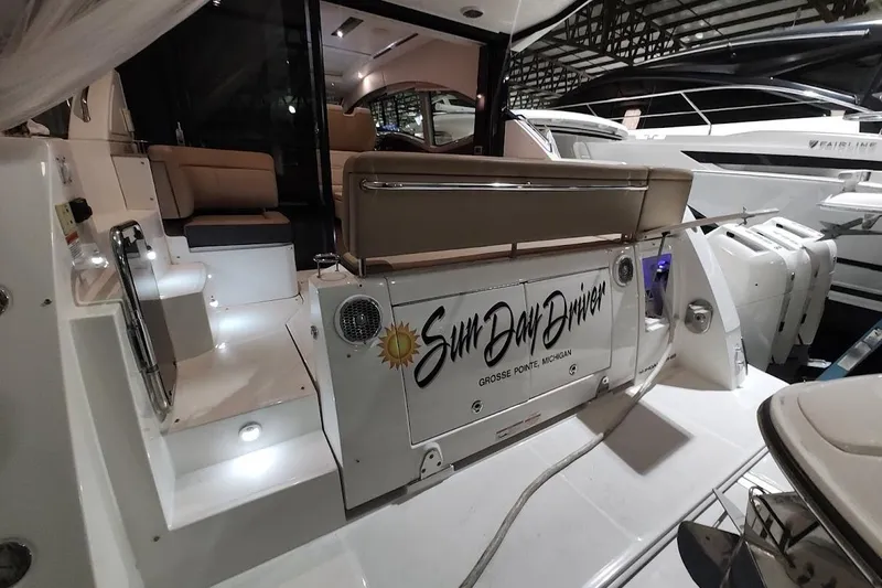 Slide: The Image of 2017 Sea Ray Sundancer 400 yacht interior with seating and illuminated steps. - 6