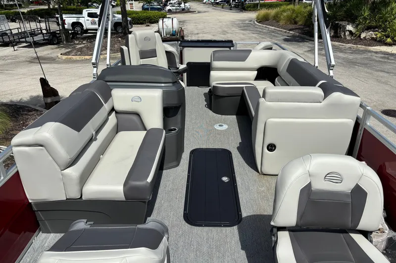Slide: The Image of 2026 Sun Tracker Fishin' Barge 22 XP3 interior with spacious seating and modern design. - 108