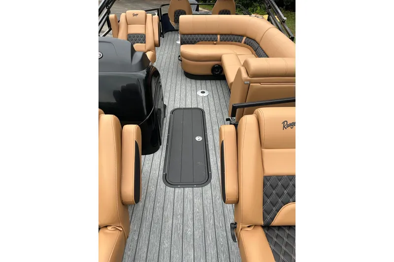 Slide: The Image of Luxurious interior of 2026 Ranger 223F boat with tan leather seating and sleek flooring. - 3