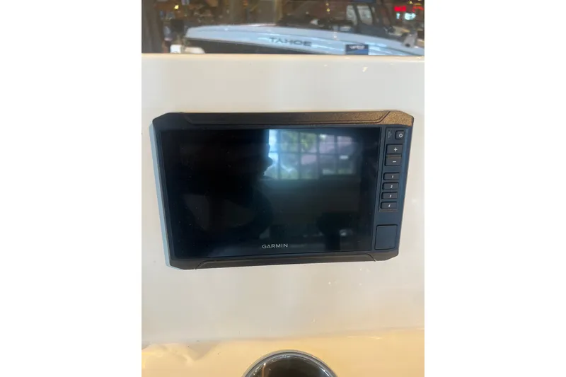 Slide: The Image of Garmin display on 2026 Mako Pro Skiff 19 CC boat dashboard. - 9